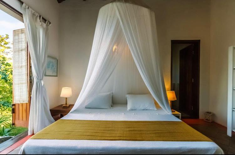 プライア・ド・エスペーリョ Espelho Bahia Blue House Bed & Breakfast エクステリア 写真